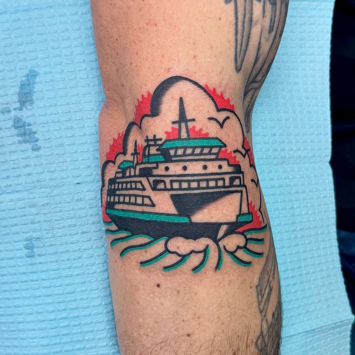 Cruise ship American traditional tattoo on the forearm by Sam