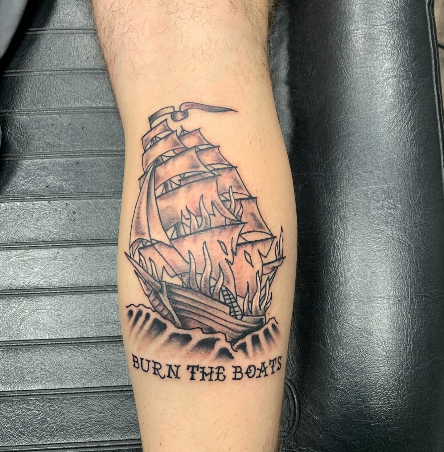 Burn the boats black and grey tattoo on the forearm by @goat76
