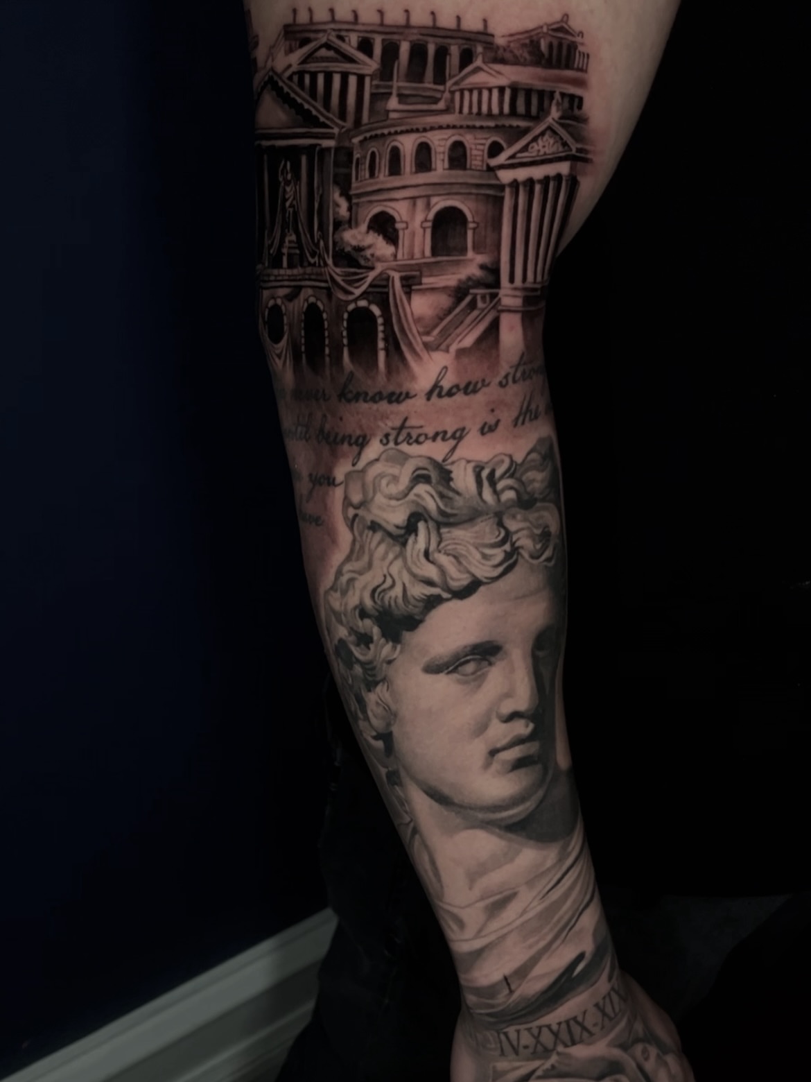Statue head realism tattoo on the forearm by Angie Morales, Laredo, Texas