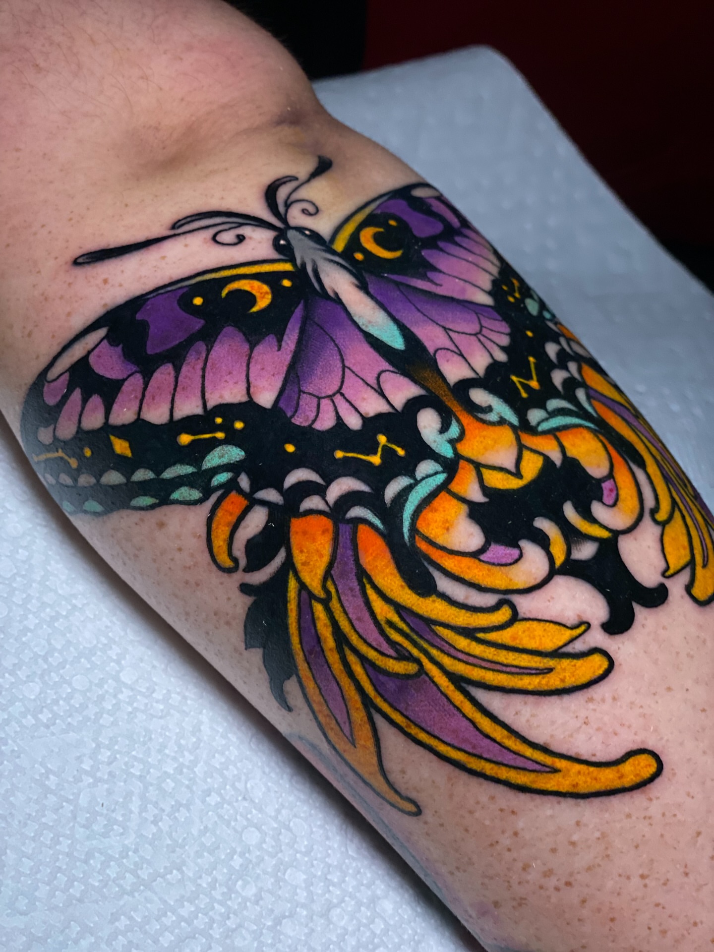 Butterfly American traditional tattoo on the forearm by Cory Cartwright