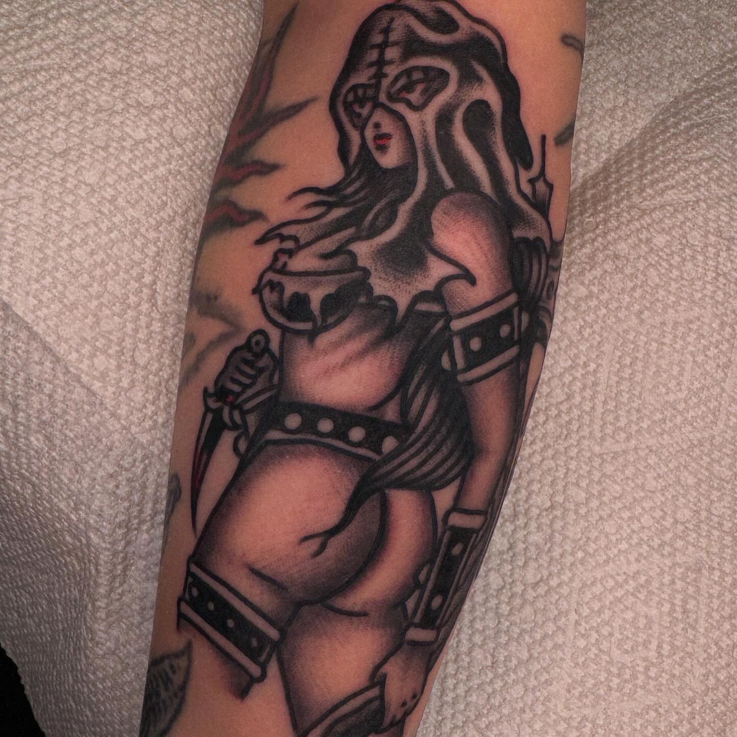 Woman warrior black and grey tattoo on the forearm by Tony Kaplan