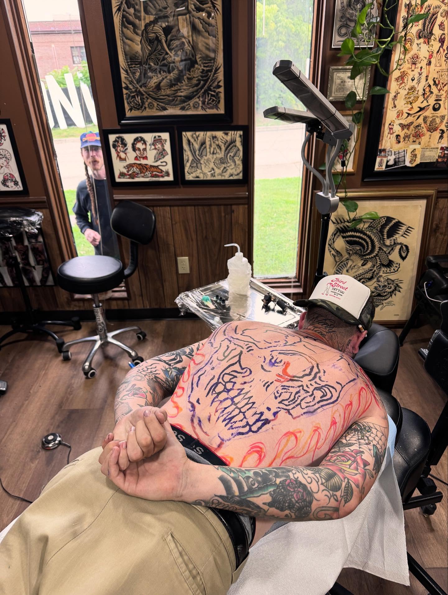 Abstract design American traditional tattoo on the torso by Ryan Engels