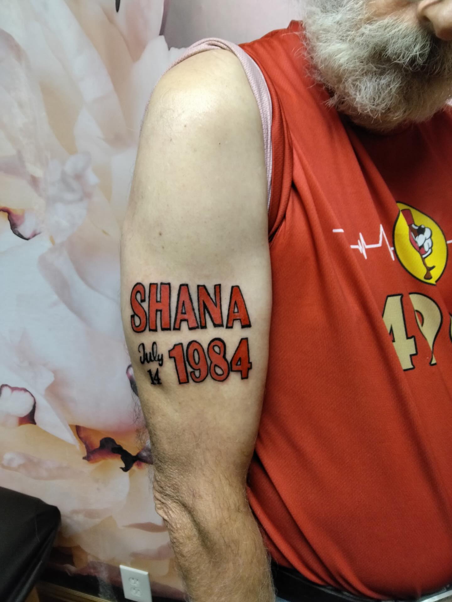 Shana 1984 July 14 lettering script tattoo on the forearm by Malynda