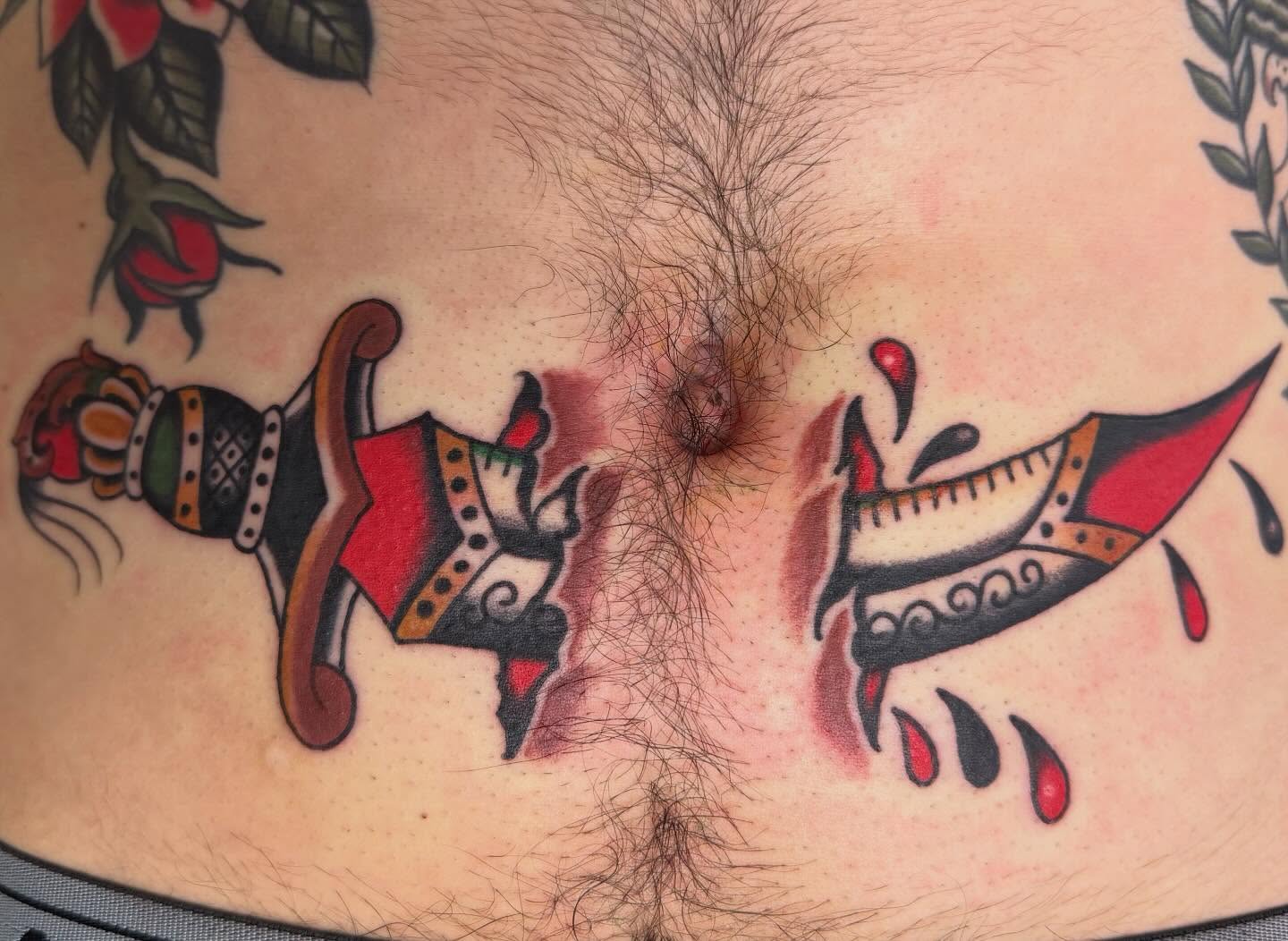 Ship and banner American traditional tattoo on the chest by David Evans