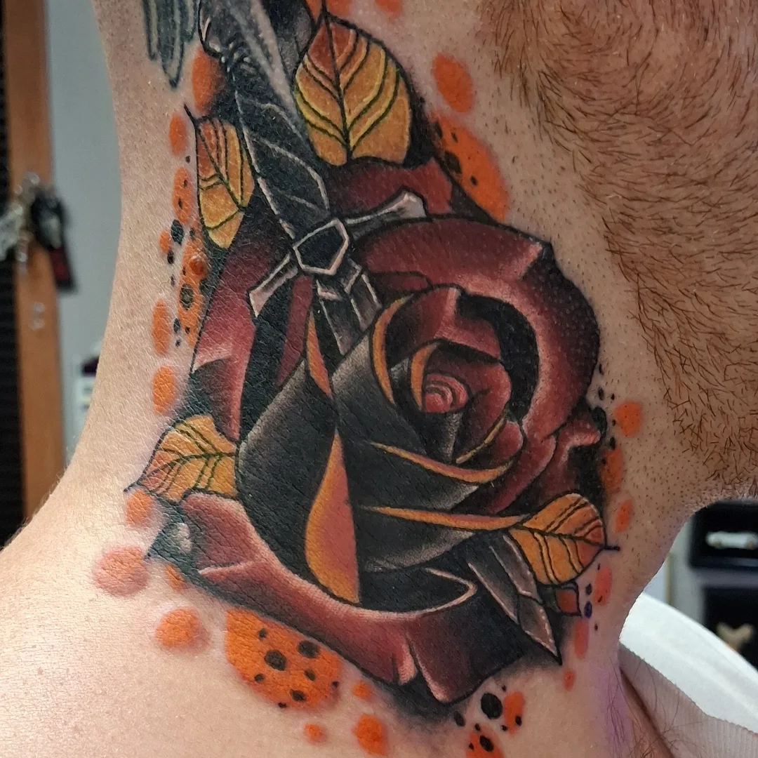 Rose American traditional tattoo on the neck by Dave Johnson, Billings, Montana