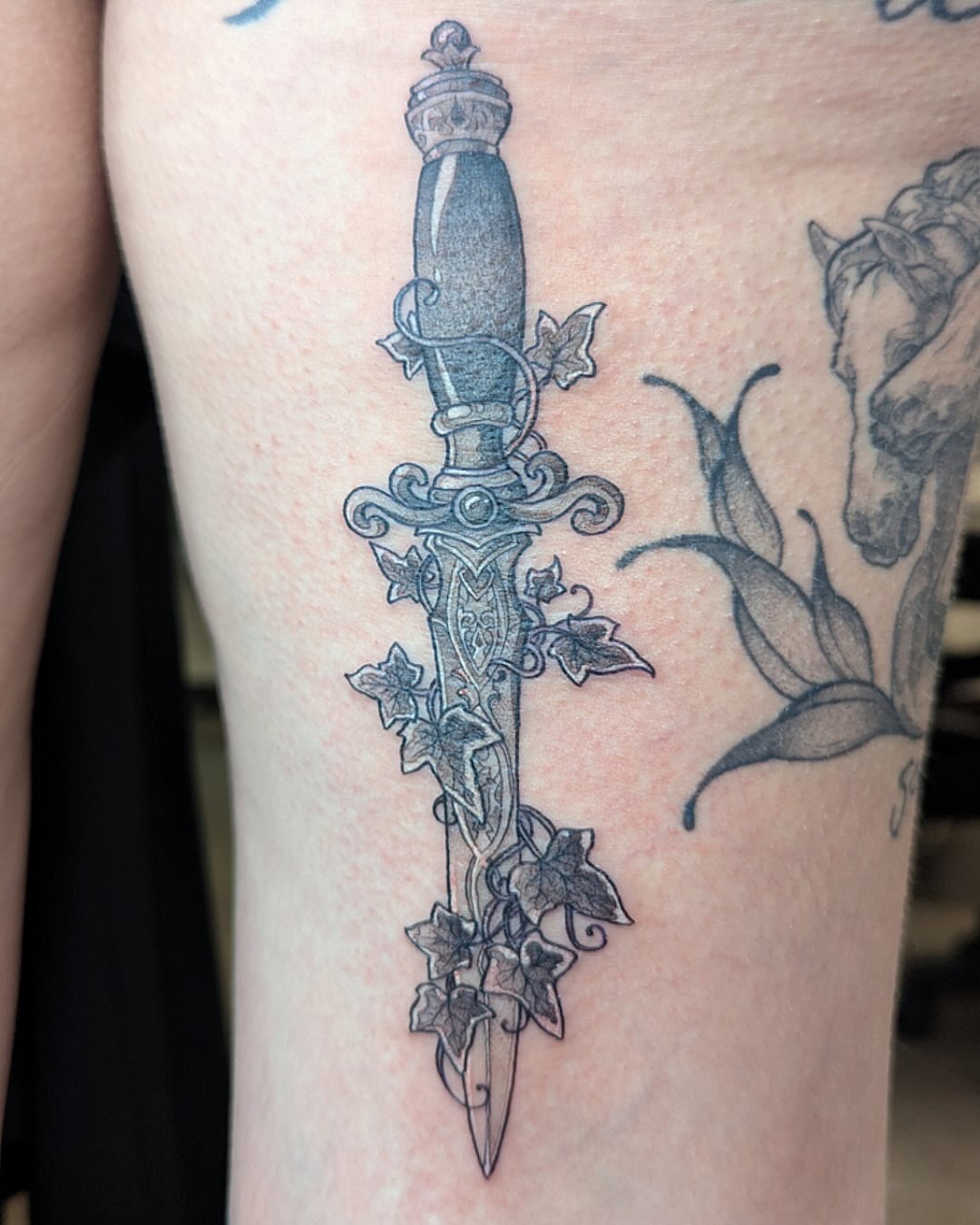 Sword black and grey tattoo on the forearm by Lepus