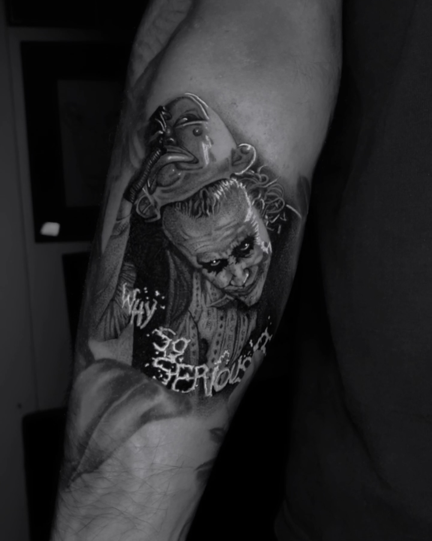 Joker realism tattoo on the forearm by Chato
