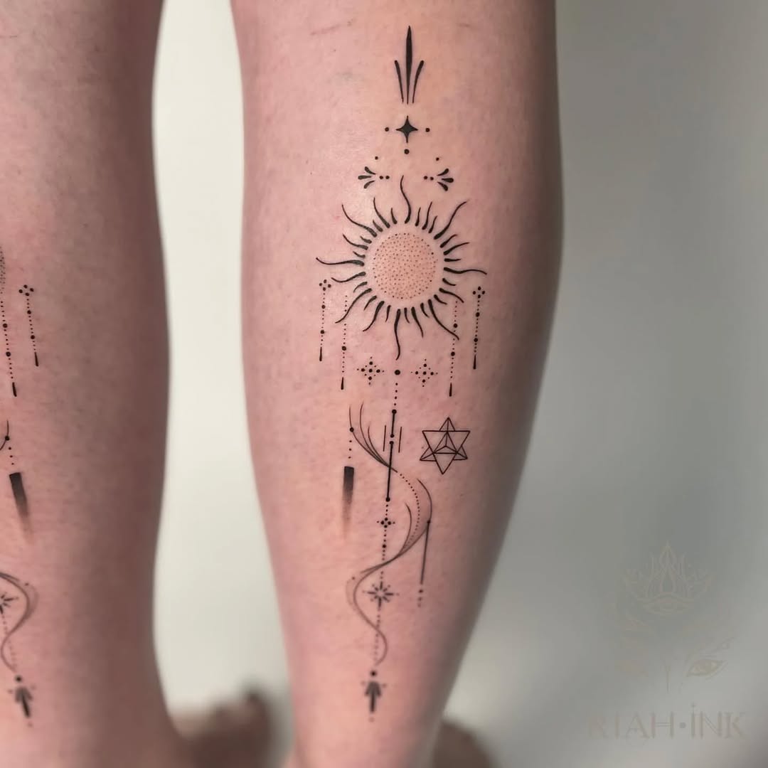 Sun and celestial elements ornamental tattoo on the calf by Nils Bashirian