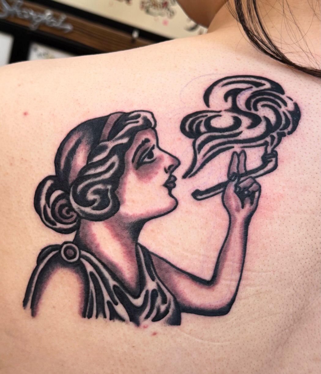 Smoking woman American traditional tattoo on the back by Jimmy Ho