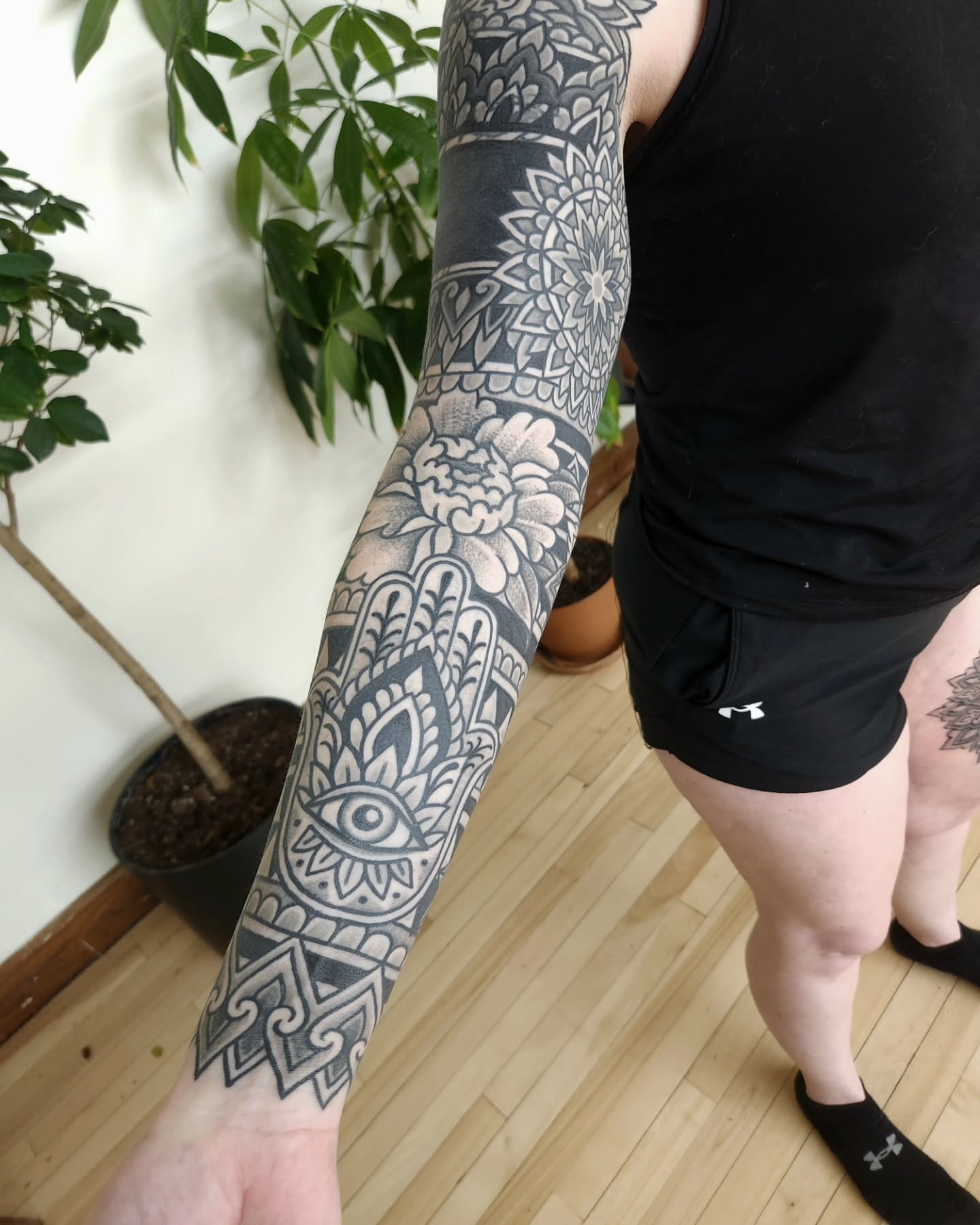 Floral mandala geometric tattoo on the forearm by Ravi Chandra, Mount Shasta, California