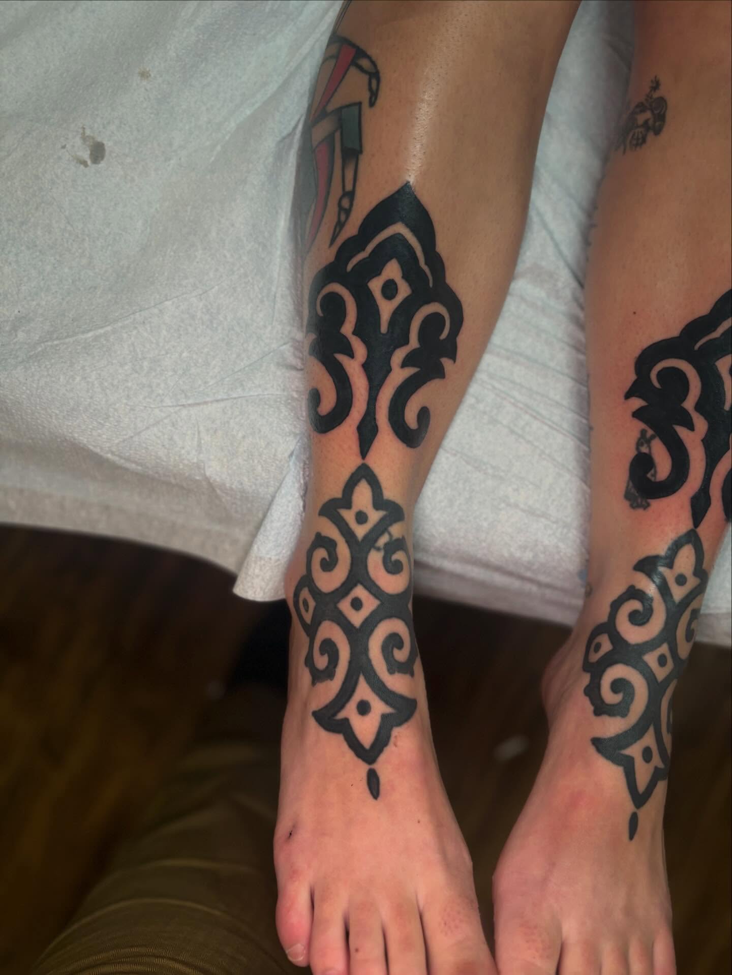 Tribal pattern tribal tattoo on the foot by Lauren Deets