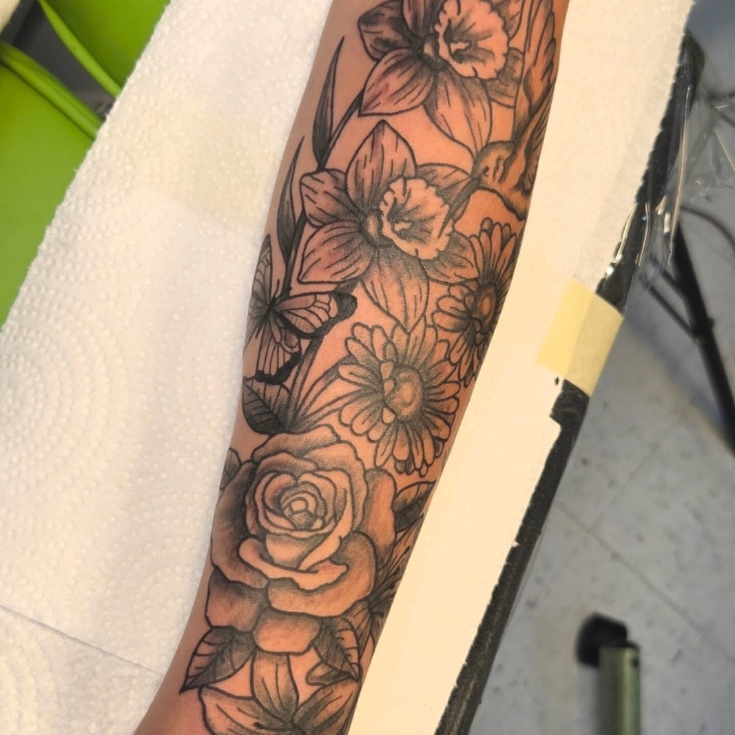Floral arrangement black and grey tattoo on the forearm by Abigail (Bgail) Boyd
