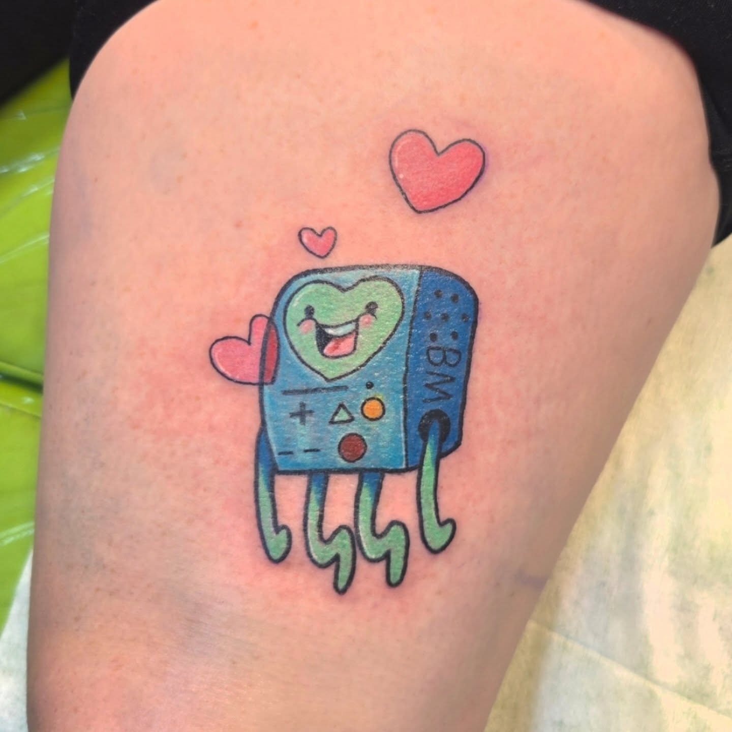 Video game console new school tattoo on the thigh by Abigail (Bgail) Boyd