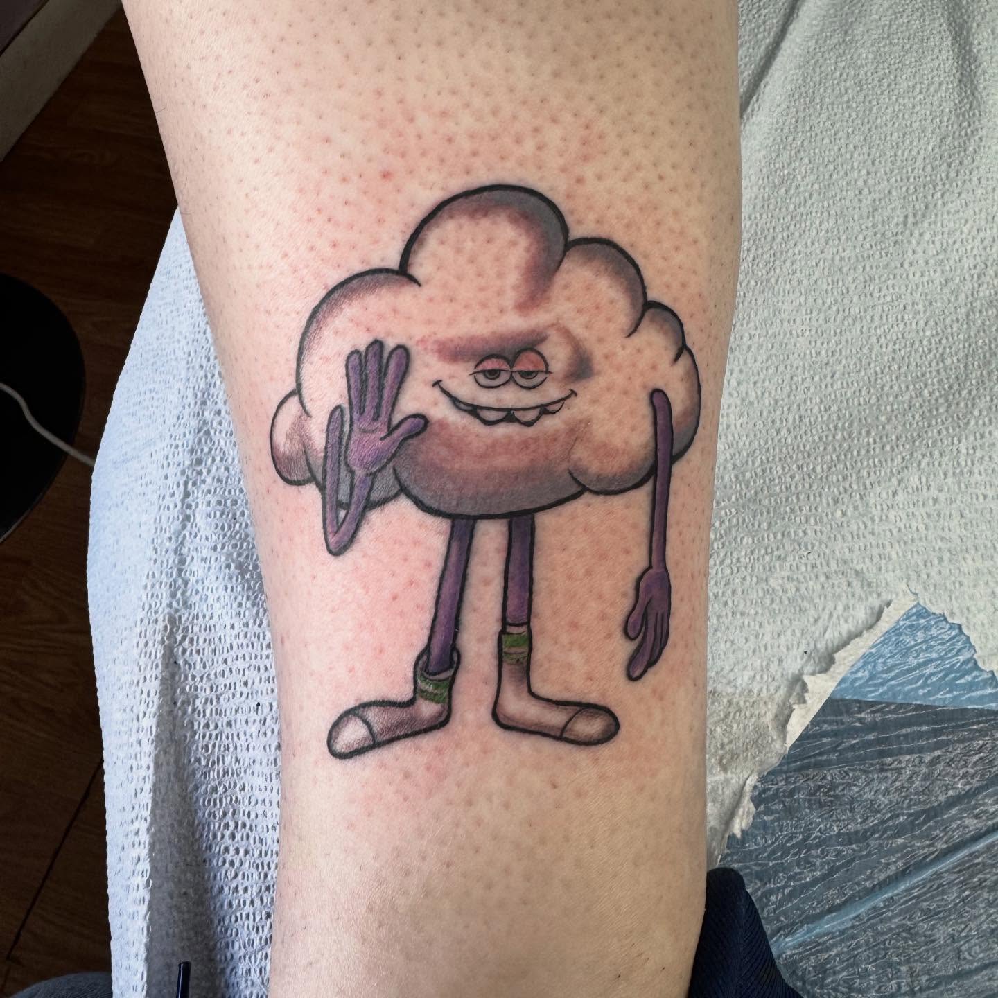 Cloud character dotwork tattoo on the forearm by Justin Fiveson