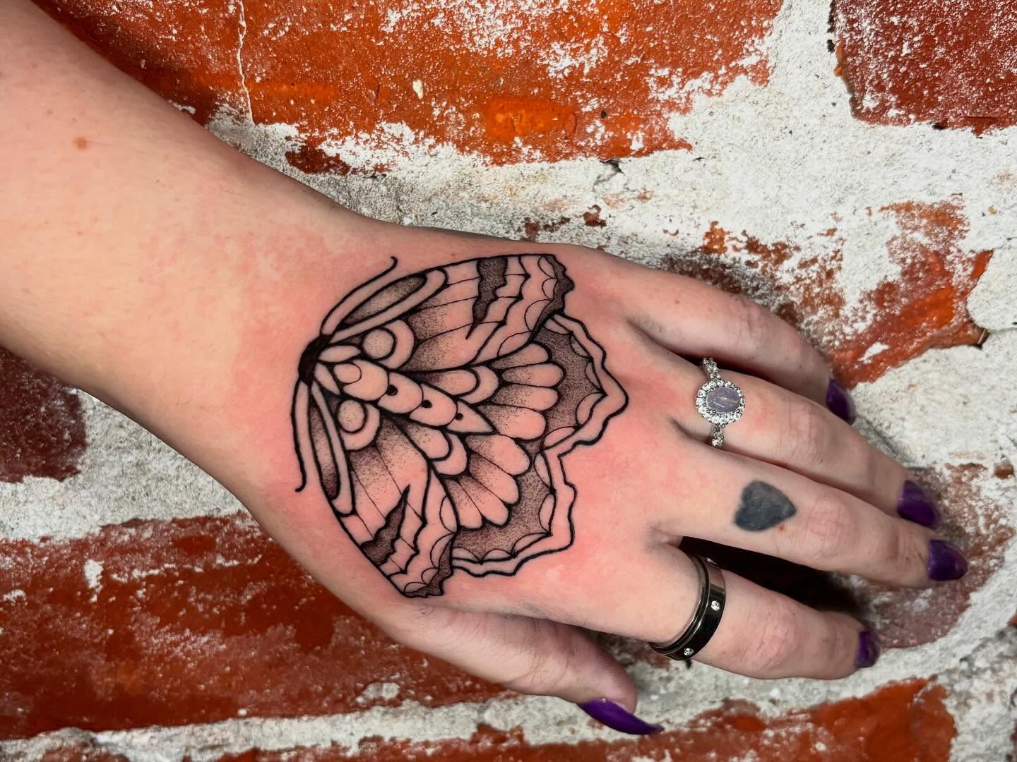 Abstract pattern dotwork tattoo on the hand by Emmy Gallagher