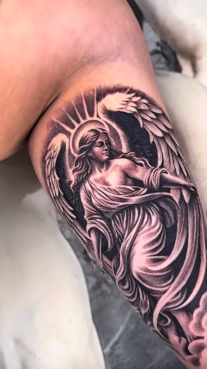 Angel realism tattoo by Fernando Andrade Jr
