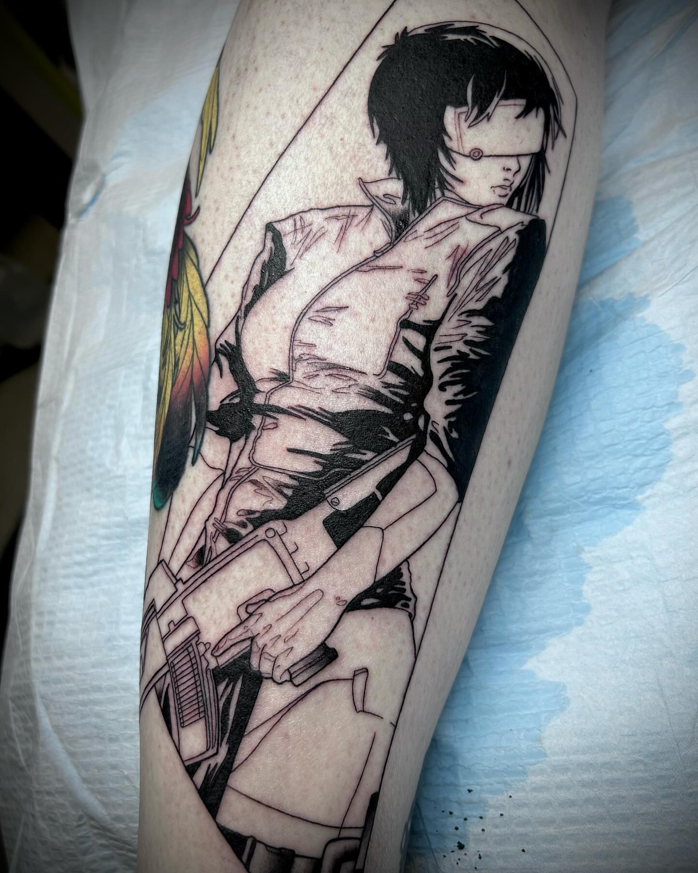 Anime couple anime tattoo on the forearm by Steve Hooker
