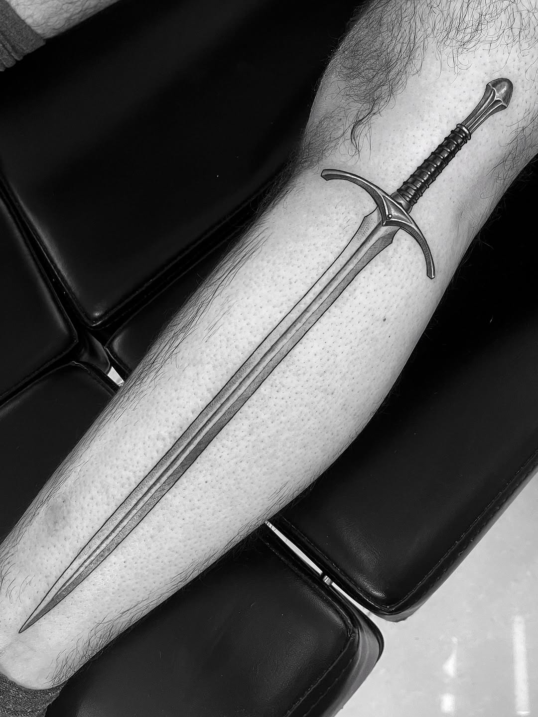 Sword sketch tattoo on the forearm by Tattoo Artist