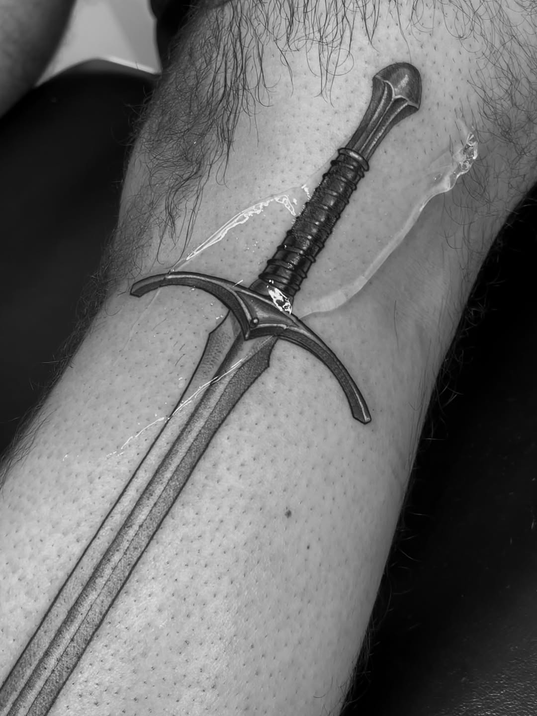 Sword sketch tattoo on the forearm by Tattoo Artist