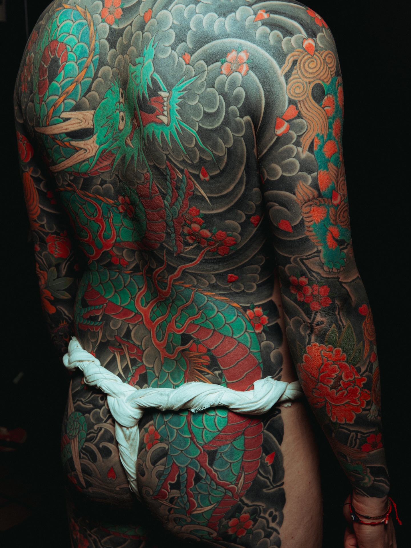 Dragon and floral japanese irezumi tattoo on the back by Mike "Yogi" Trube