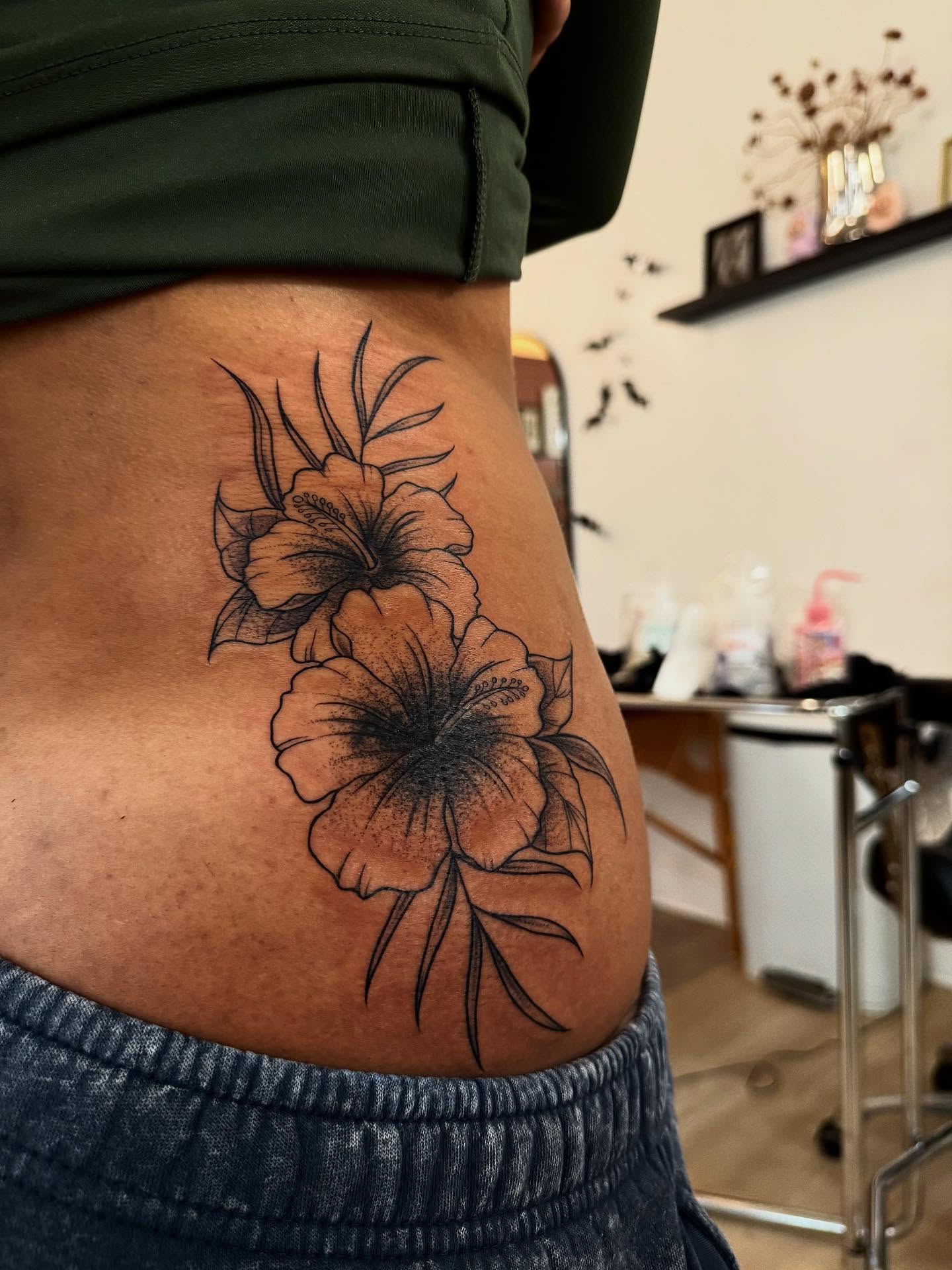 Hibiscus flowers black and grey tattoo on the thigh by MISO ⟡ Bay Area Tattoo Artist