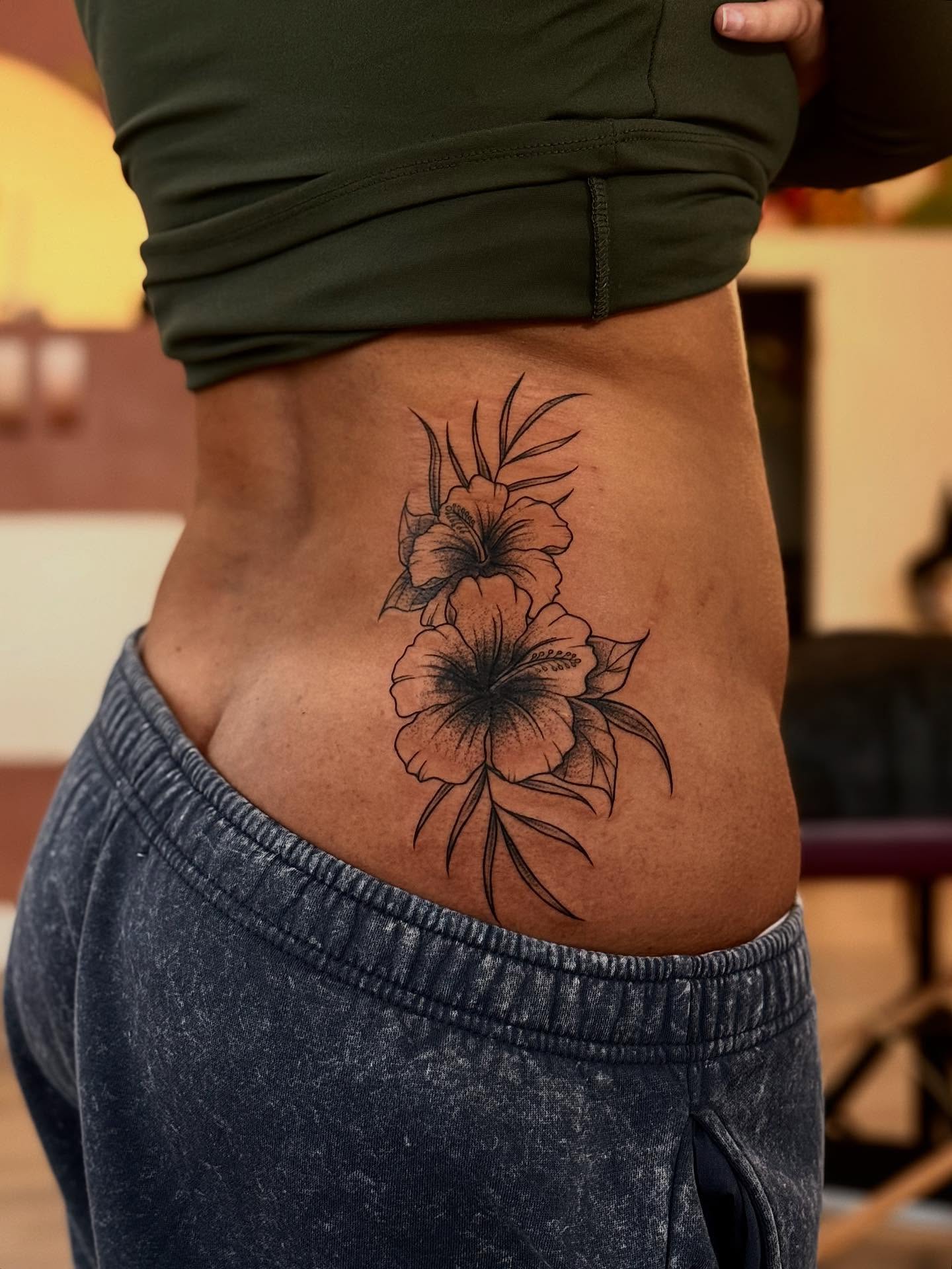 Flowers black and grey tattoo on the torso by MISO ⟡ Bay Area Tattoo Artist
