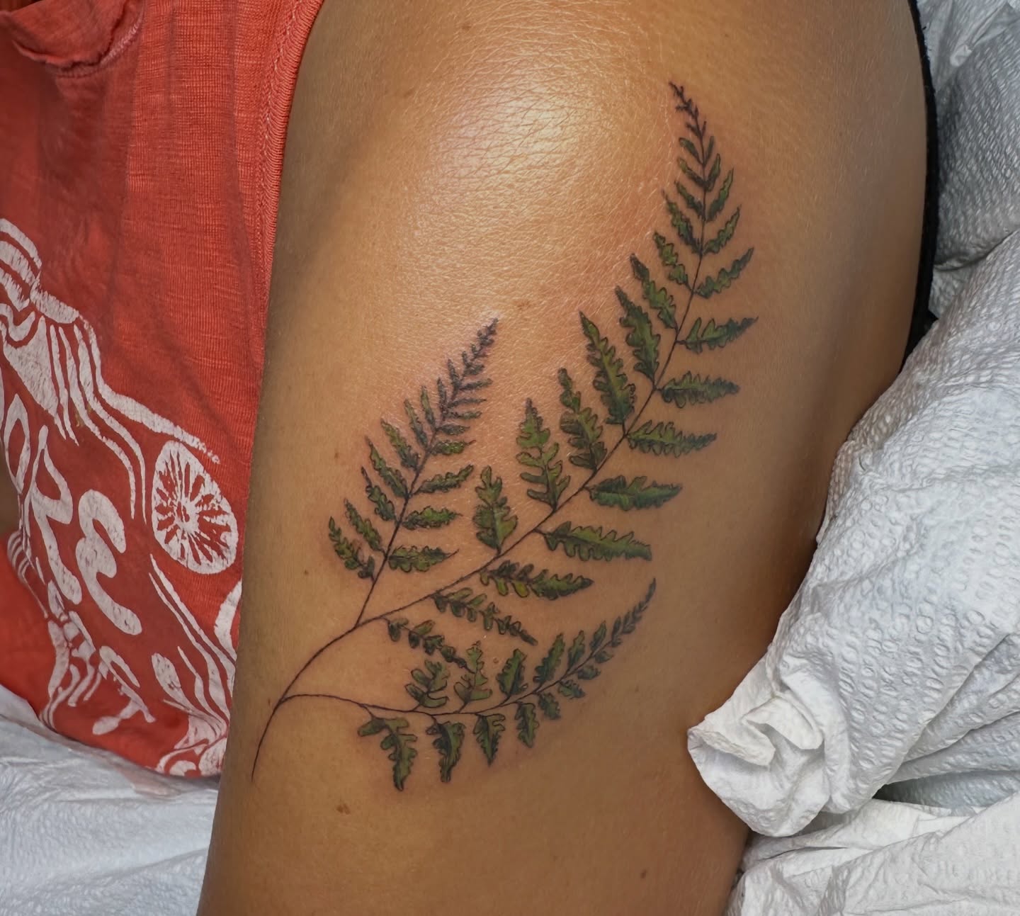 Fern realism tattoo on the thigh by Lauren DeLizza