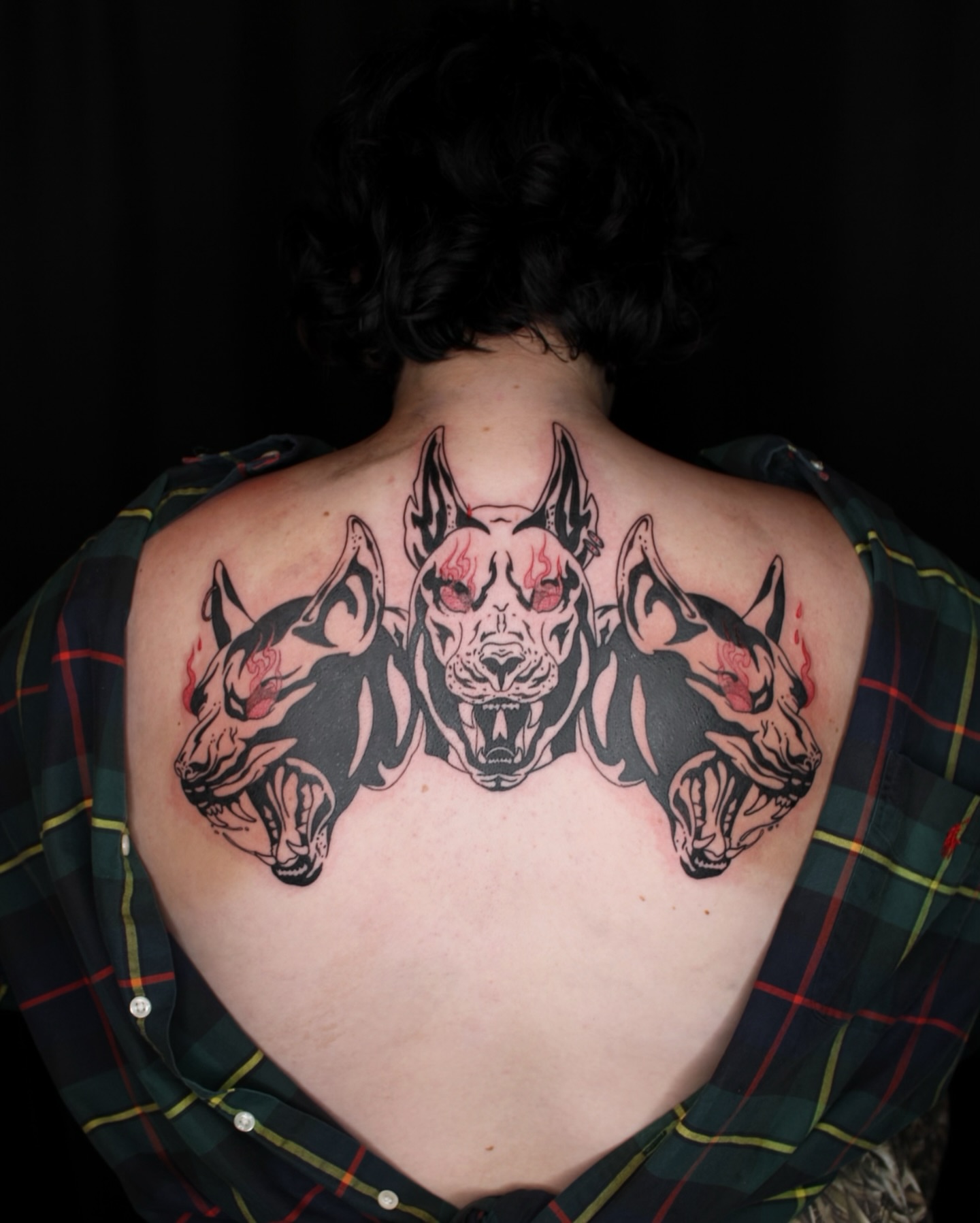 Dog heads dark realism tattoo on the back by ππ²π§π§ ππ’π₯πππ« (π©π¦