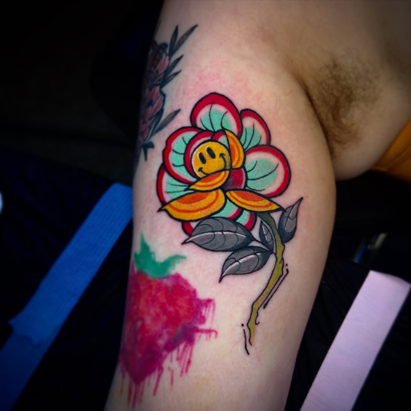 Floral design American traditional tattoo on the forearm by Jeff Brock