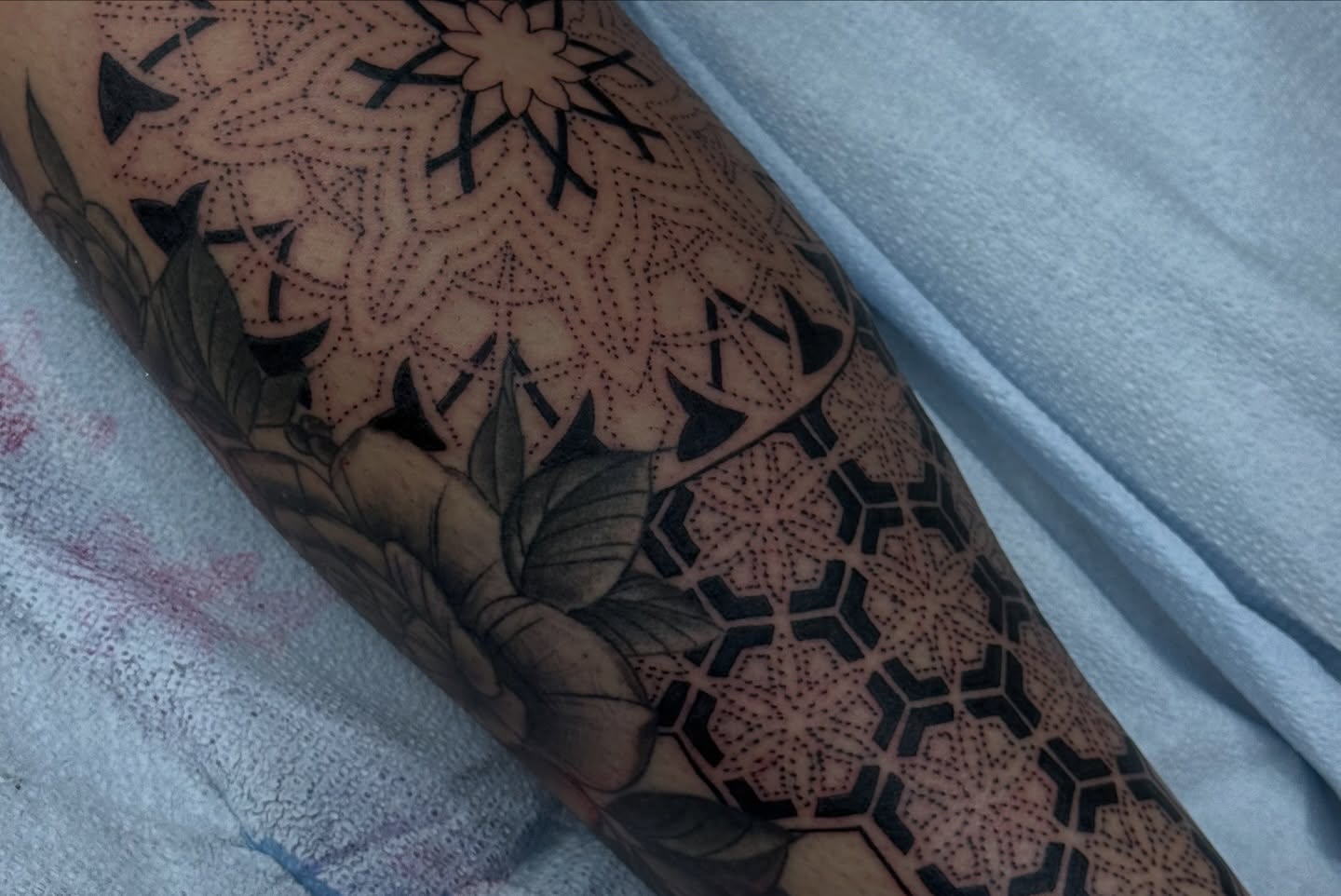 Tattoo by @tattoos_by_lo — dotwork, geometric