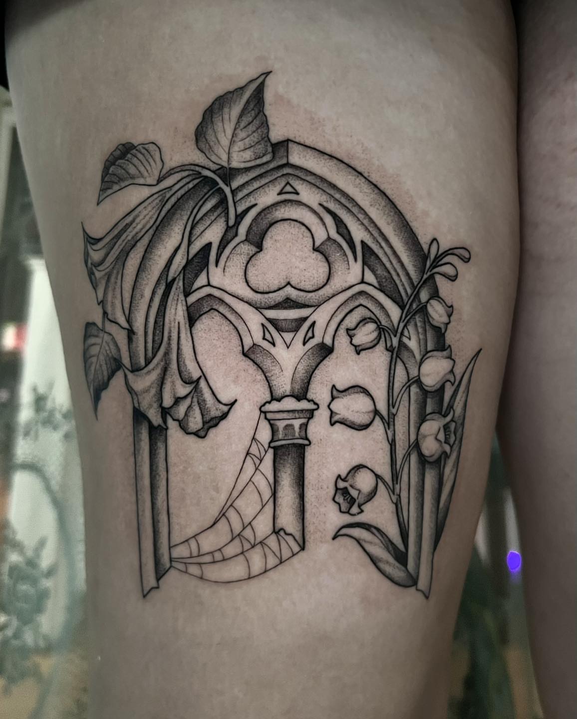 Gothic arch black and grey tattoo on the thigh by Mikaela Rush, Greensboro, North Carolina