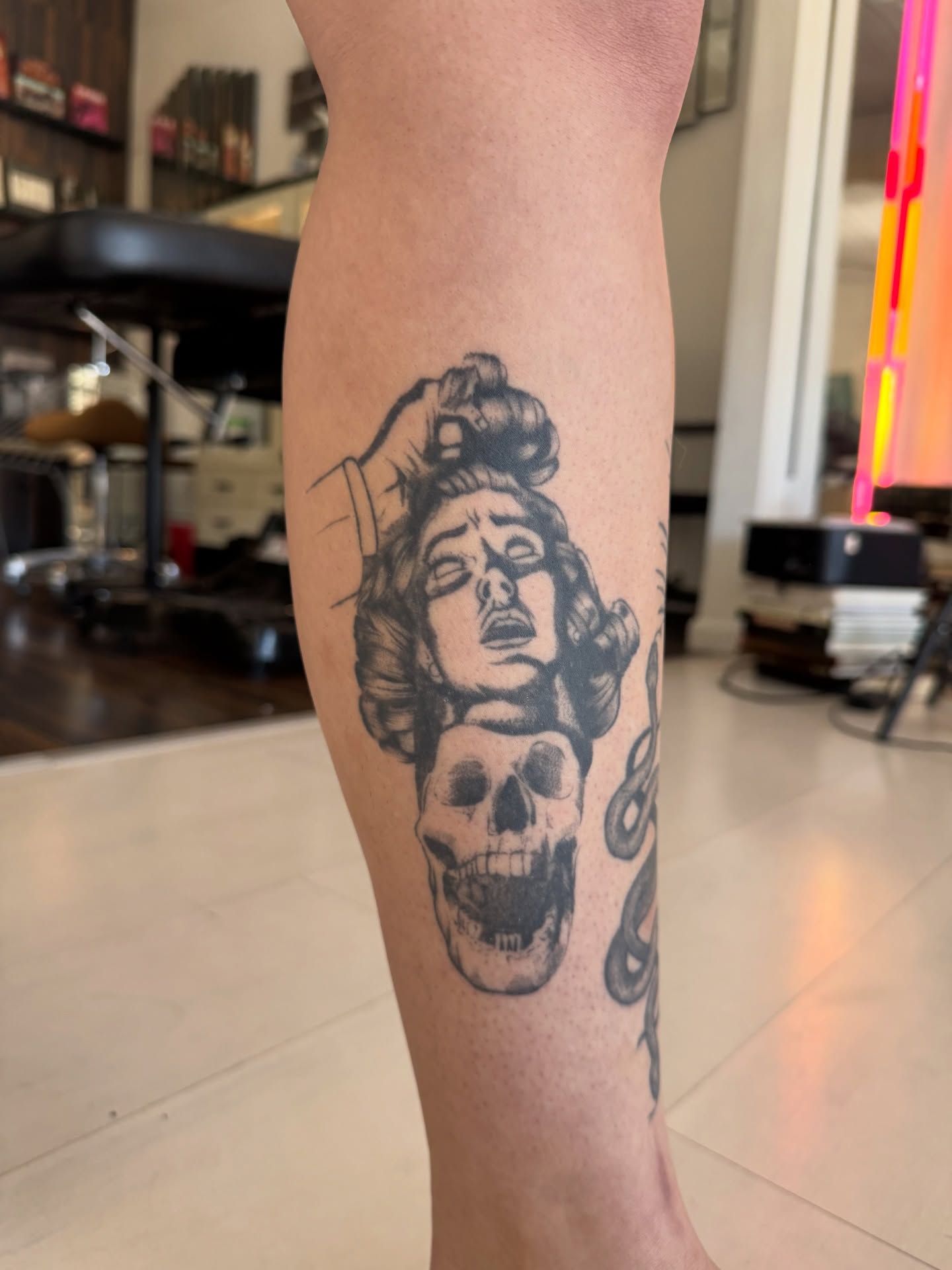 Woman with skull black and grey tattoo on the forearm by Zanereti