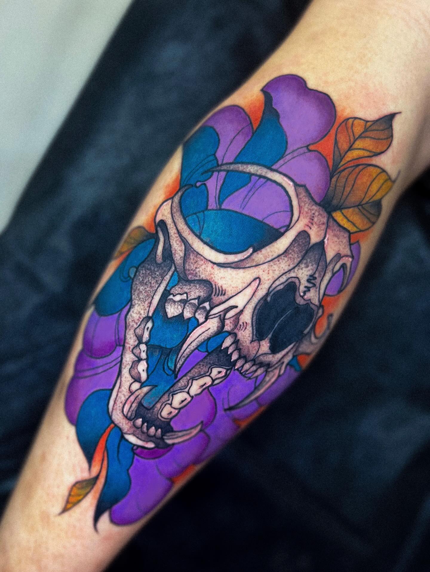 Skull and flower new school tattoo on the forearm by Ashley Fino, Las Vegas, Nevada