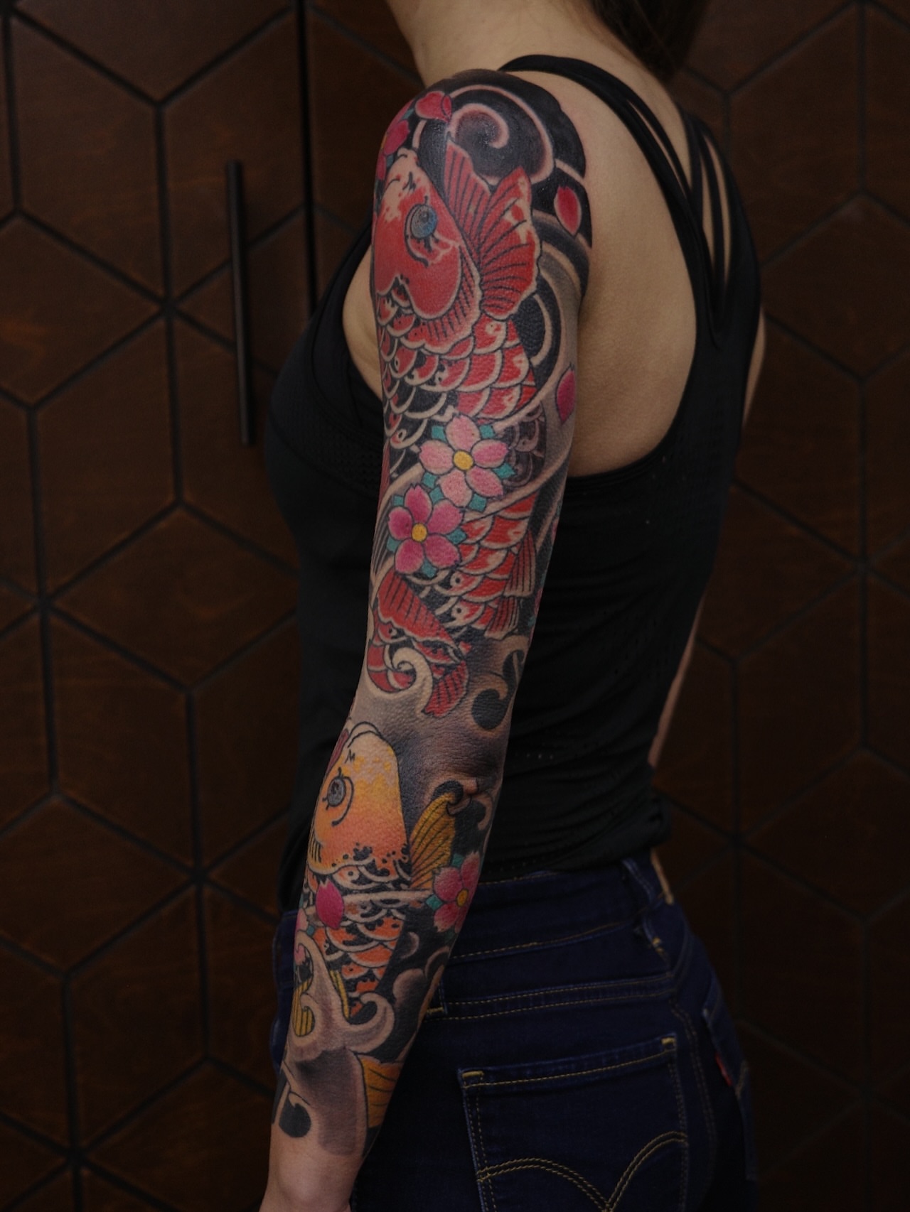 Koi fish and flowers japanese irezumi tattoo on the upper arm by Innokenty Meshchakov, Portland, Oregon