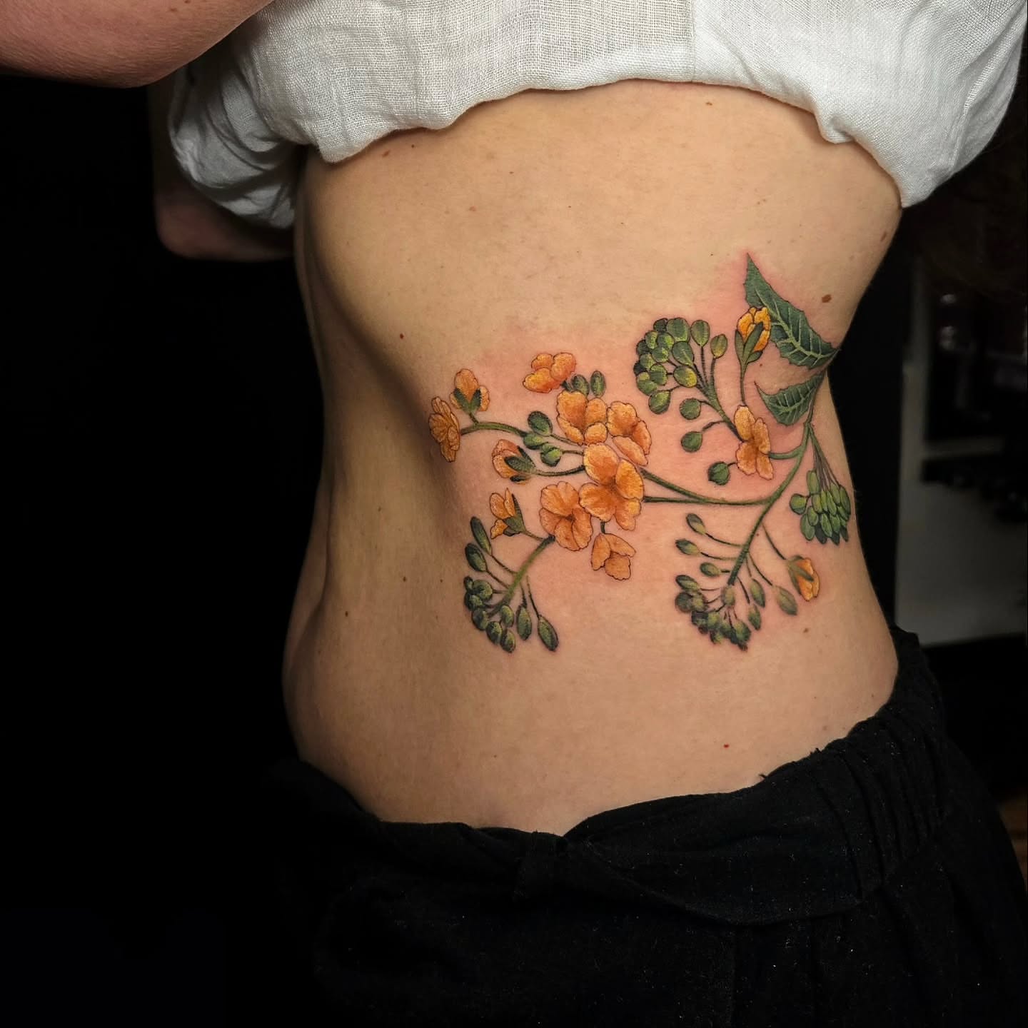 Tattoo by @glasswingtattoo — watercolor