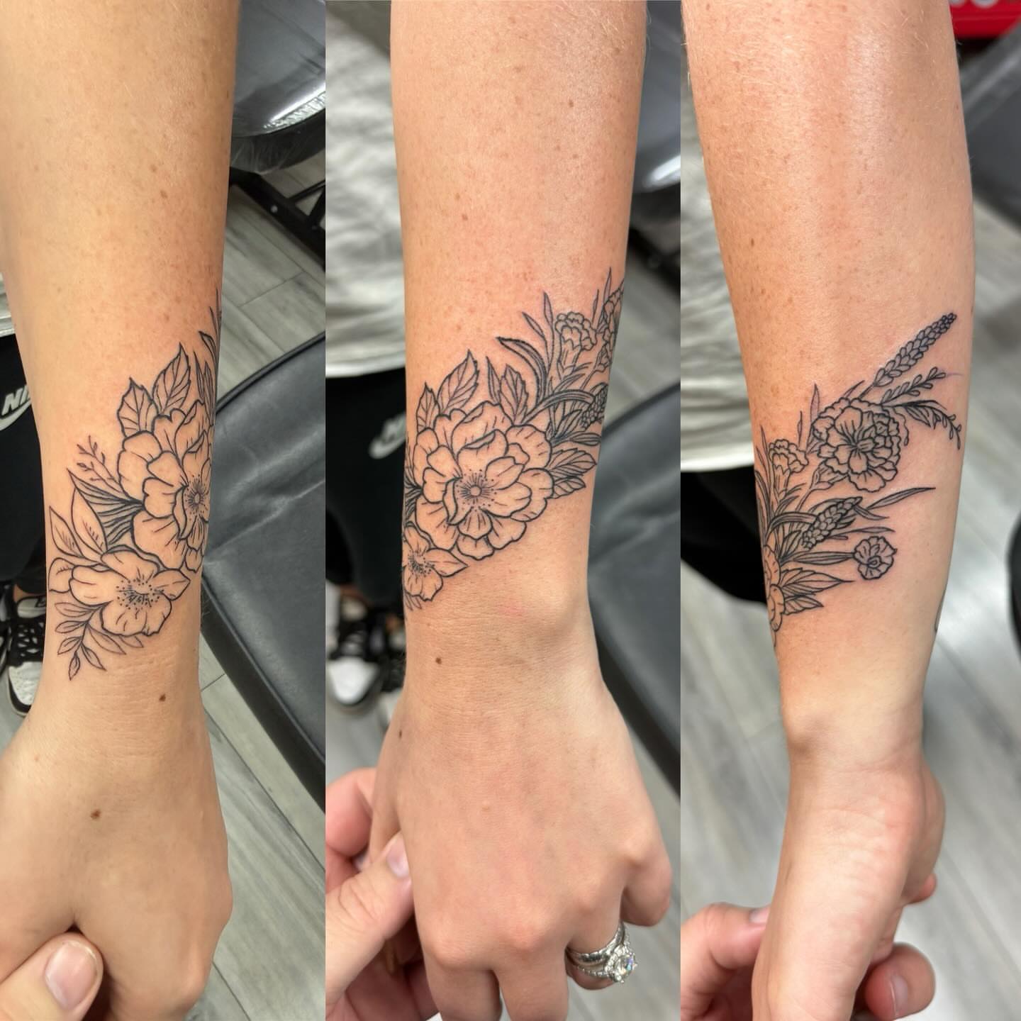 Floral bouquet black and grey tattoo on the forearm by Daniel Smith