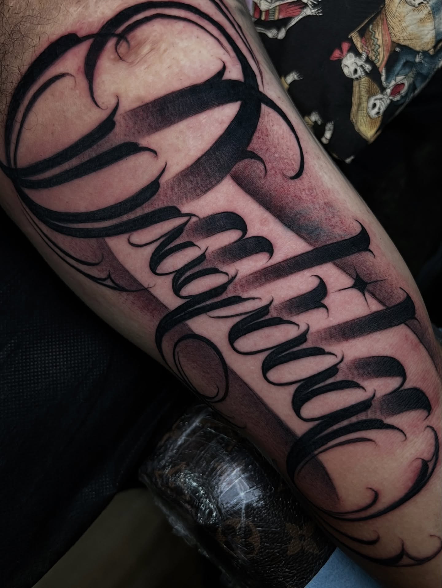 Script lettering lettering script tattoo on the forearm by Flames, Cerritos, California