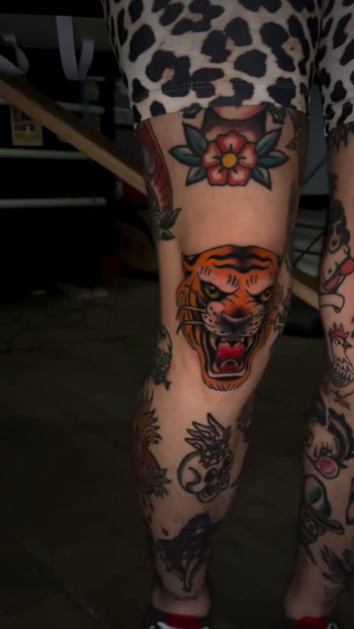 Tiger head realism tattoo on the leg by Olivia Marie