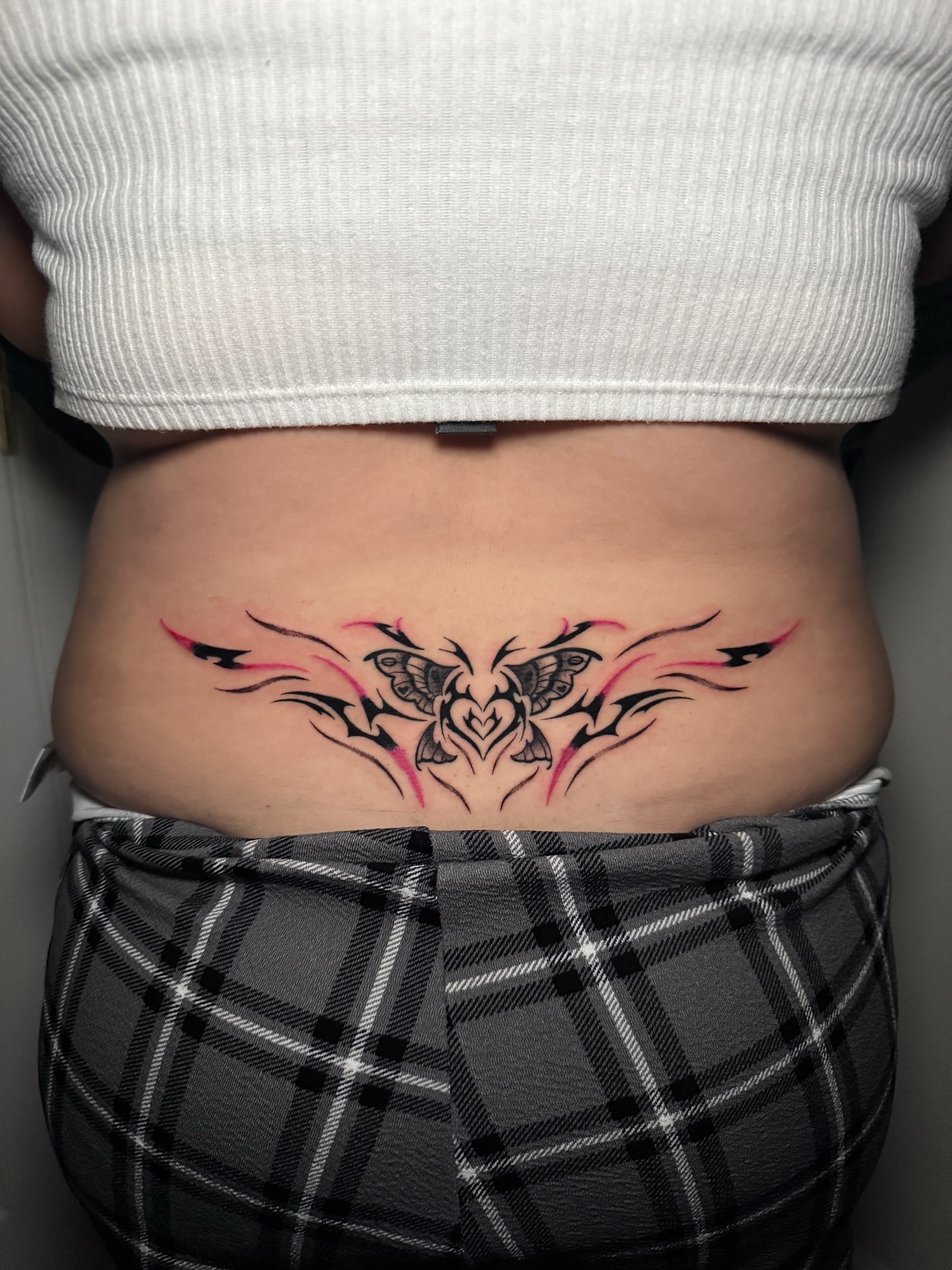 Butterfly tribal tattoo on the torso by 𝕹𝖆𝖙
