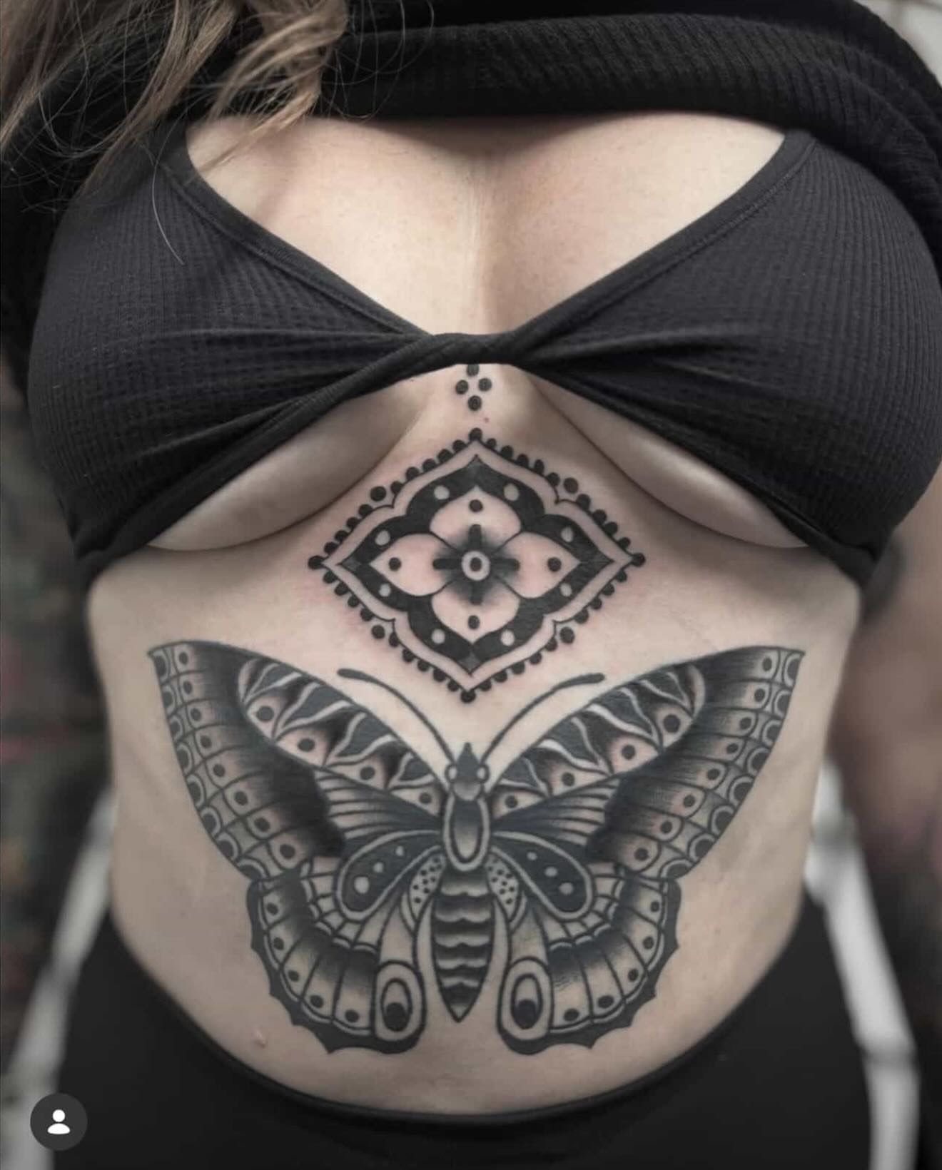 Butterfly geometric tattoo on the torso by Micah Norman, San Francisco, California