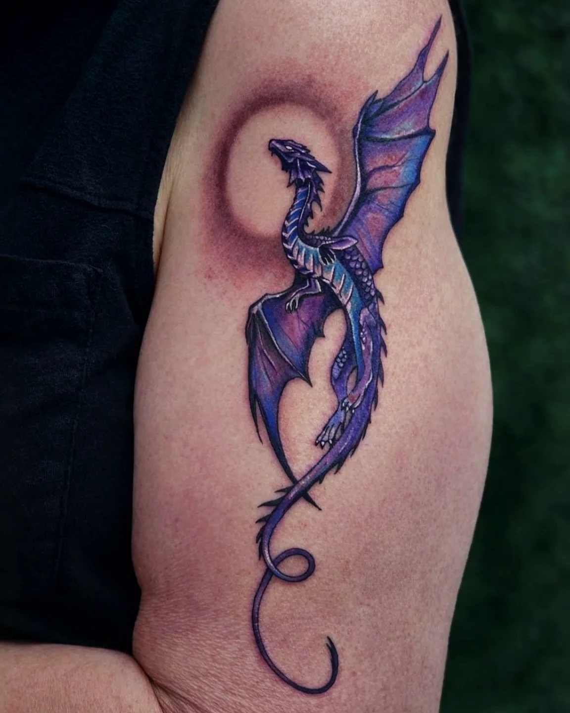 Dragon new school tattoo on the forearm by Marlayna Connelly