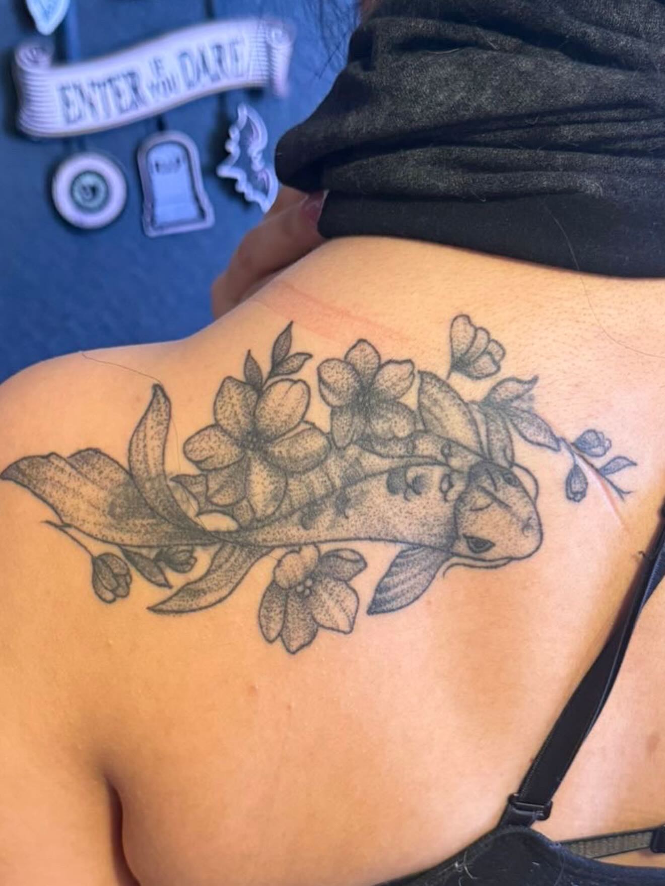 Koi fish and flowers dotwork tattoo on the shoulder by Gabs Borderline Tattoos βπΌ