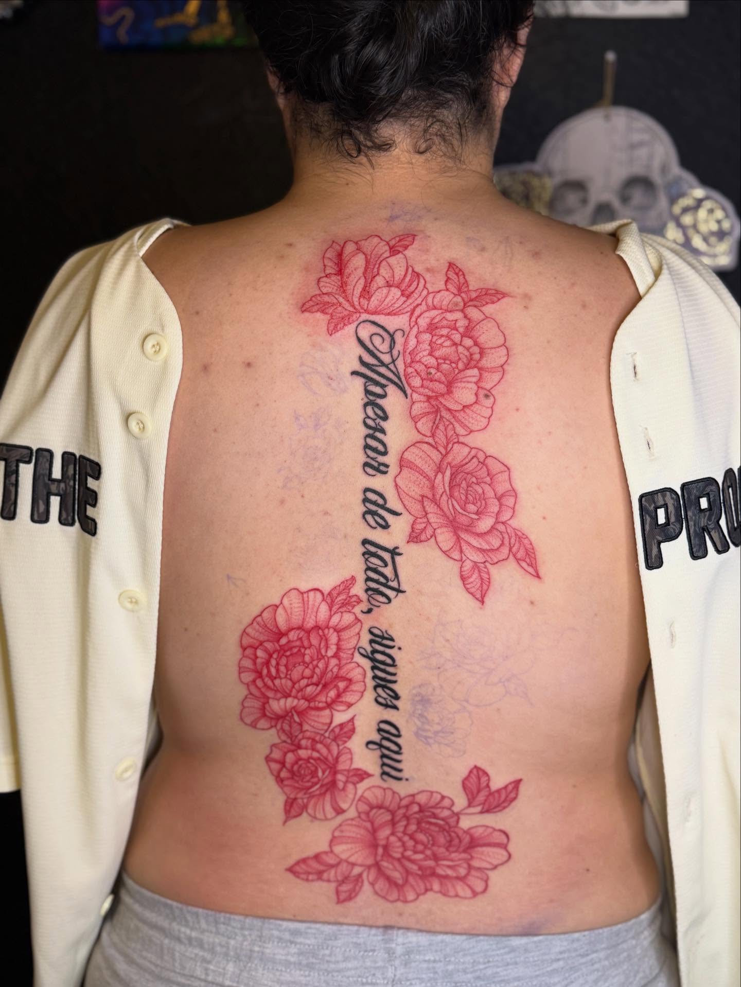 Flowers and script fine line tattoo on the back by Gabs Borderline Tattoos βπΌ