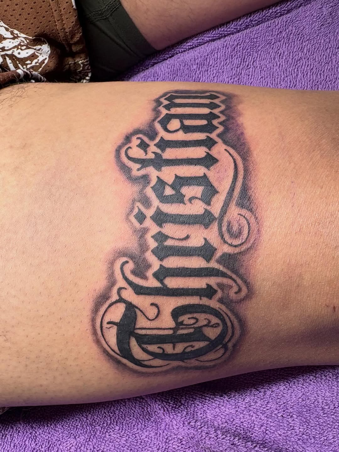 Script lettering Chicano tattoo on the forearm by Sonia vidal