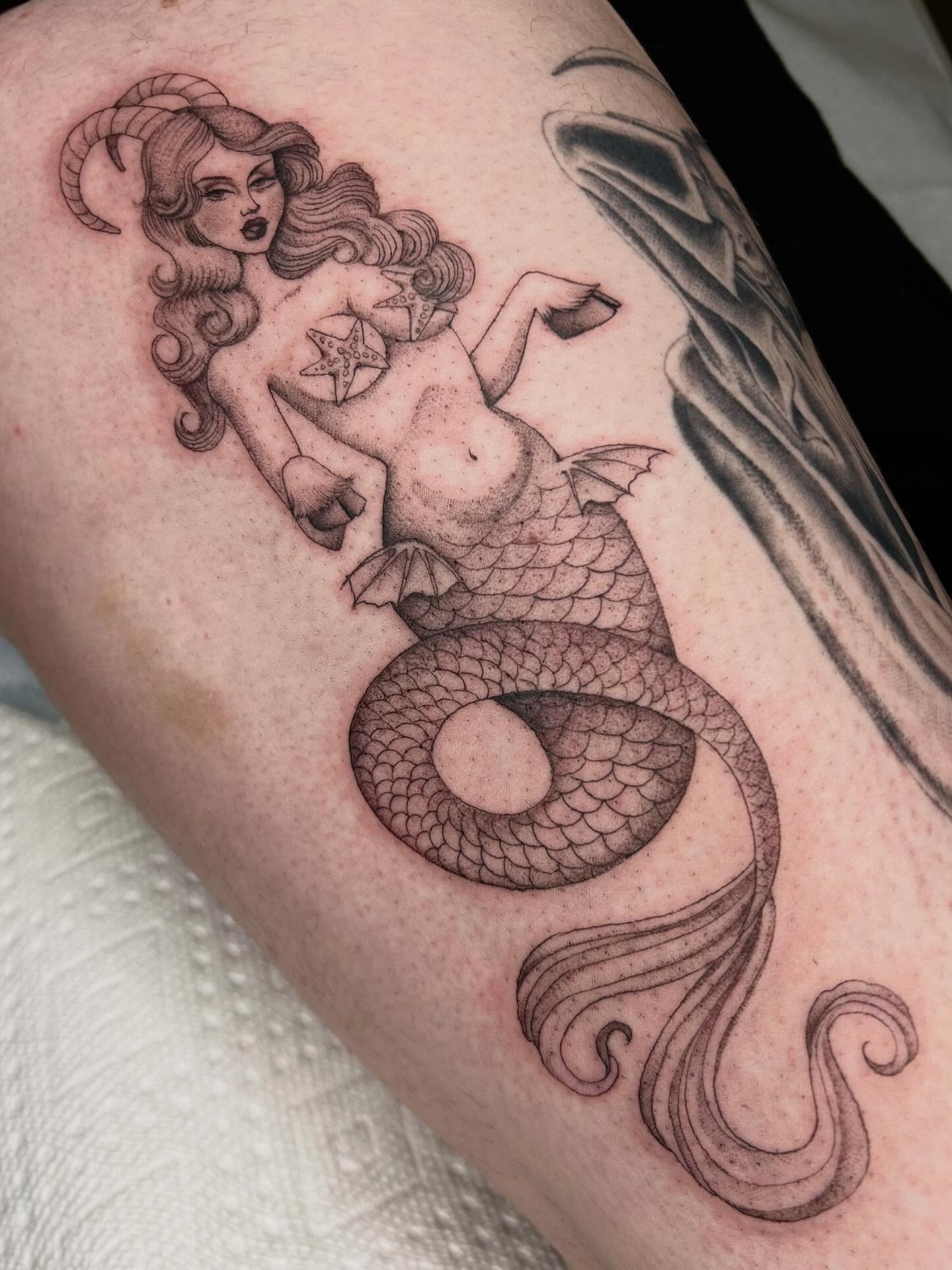 Mermaid American traditional tattoo on the thigh by Olivia Fox