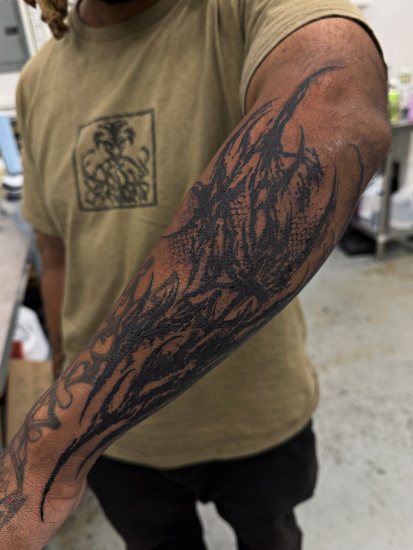 Dragon black and grey tattoo on the forearm by Penelope