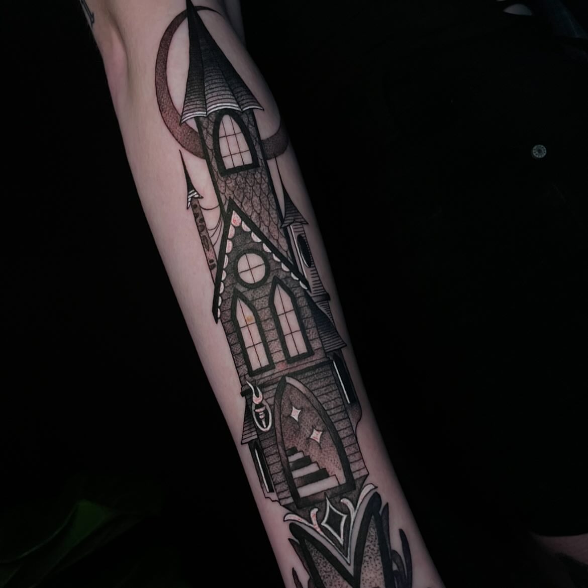 Church black and grey tattoo on the forearm by Reagan Mauldin