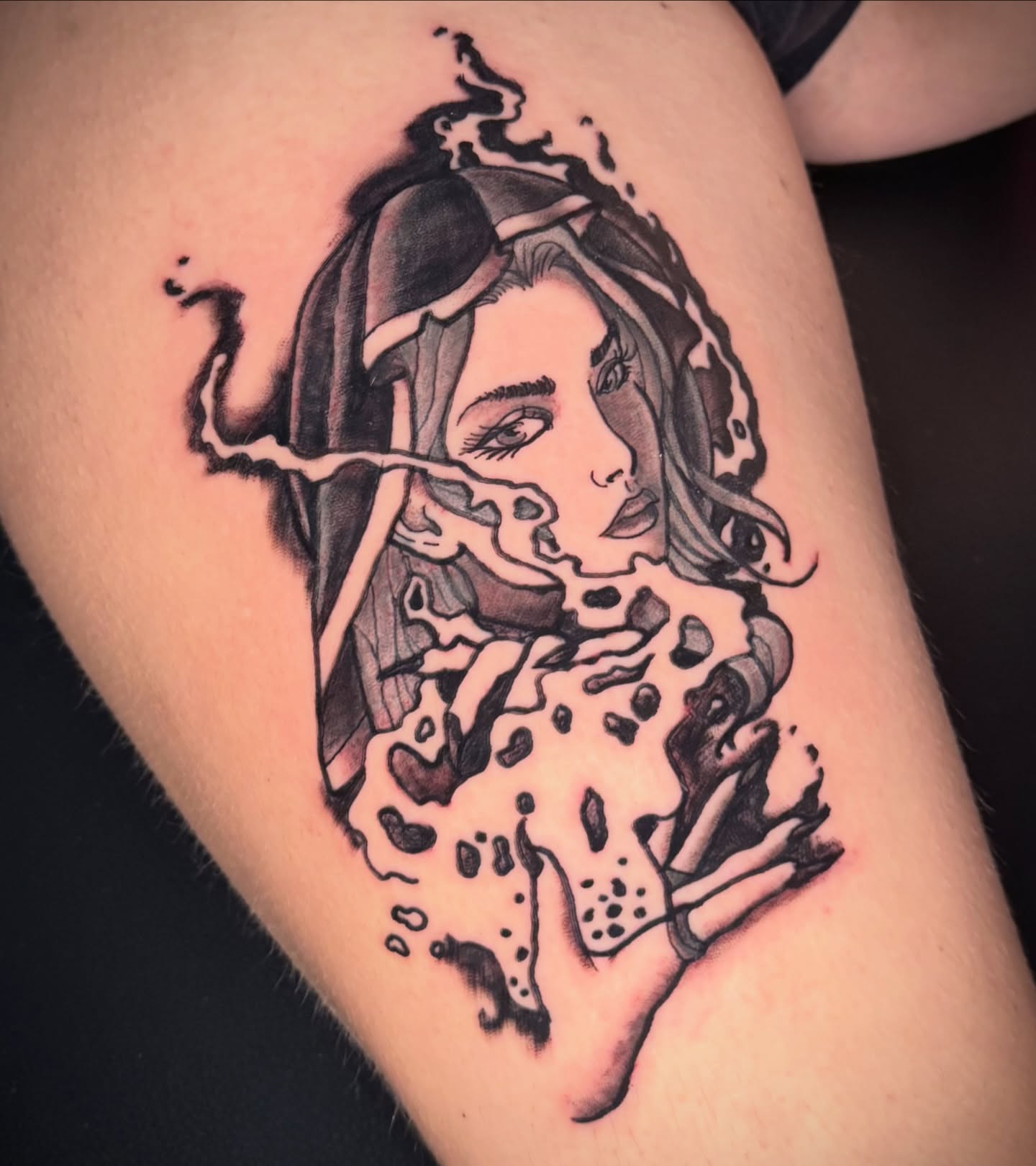 Melting woman realism tattoo on the thigh by Bob Howdy