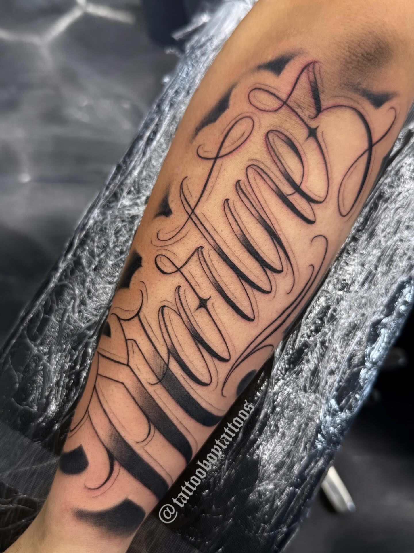 Script lettering lettering script tattoo on the forearm by TattooBoyTattoos