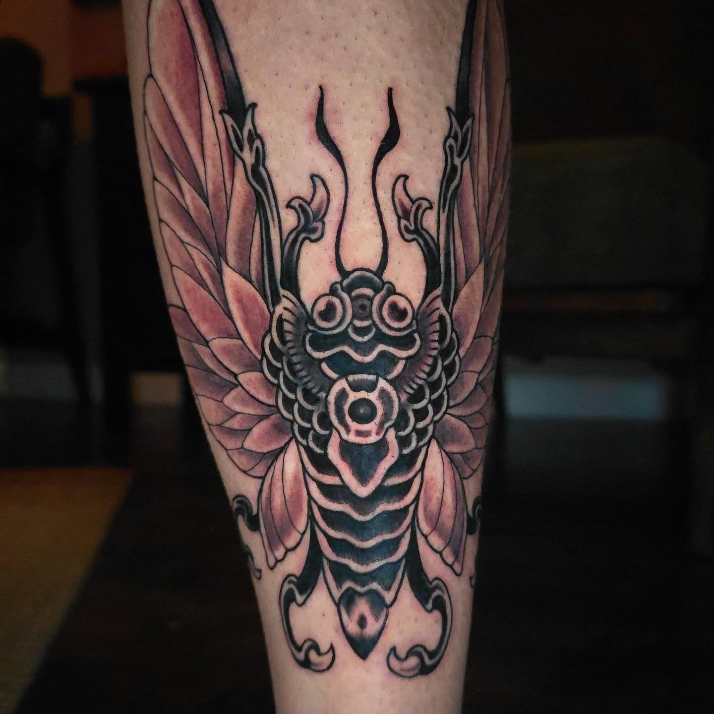 Insect geometric tattoo on the forearm by Joseph Jeffers